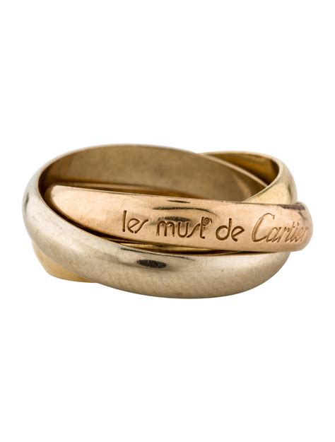 les must de cartier meaning.